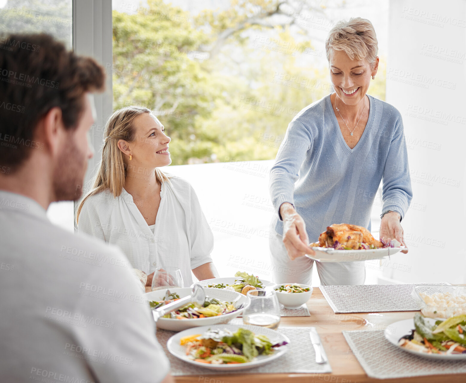 Buy stock photo family, relax and dinner together in family home for happiness, big family conversation or healthy food at table. Happy lifestyle, women and man smile, eating lunch and luxury celebration in home