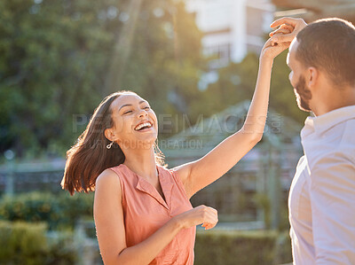 Buy stock photo Couple, happy and dance outdoor for love, care and support or relationship bonding together. Woman, dancing celebration with man and quality time or comic romance, happiness and smile in park