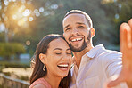Couple, funny selfie and happiness while outdoor in summer on vacation for love, care and memory or profile picture for social media. Portrait of a happy man and woman in nature for a romantic date