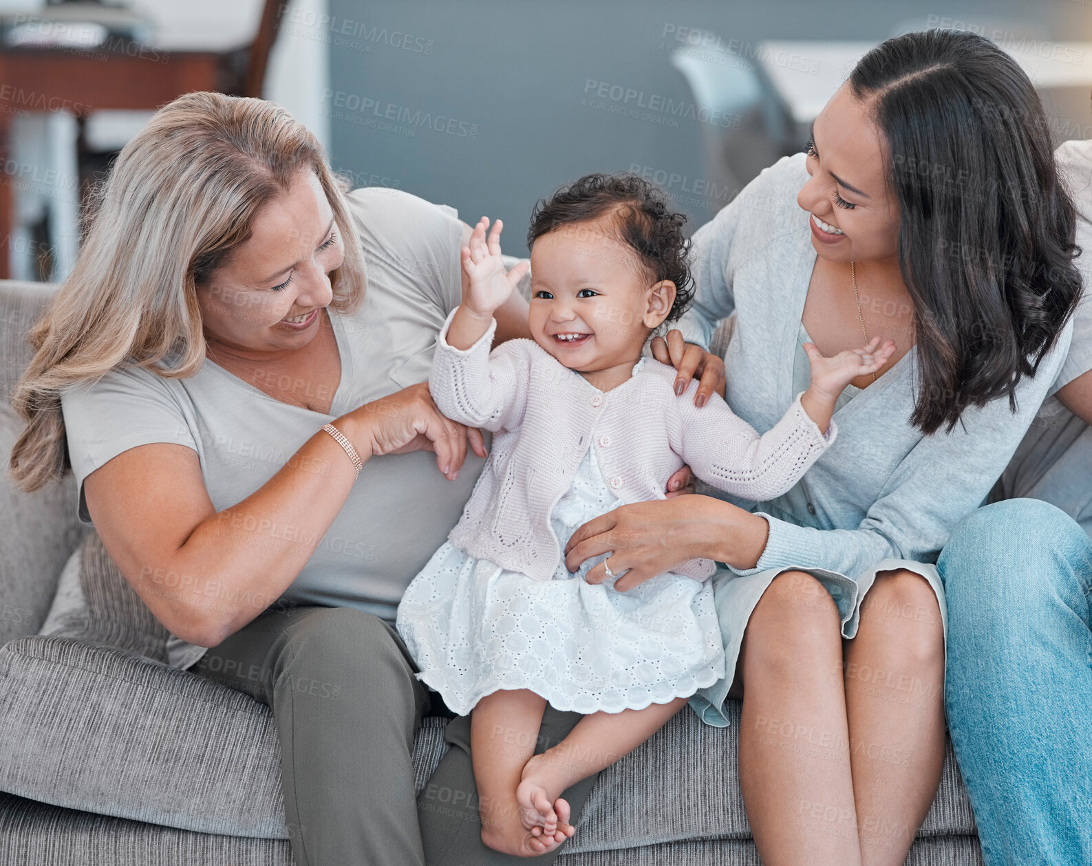 Buy stock photo Family home, love and baby, mother and grandmother with happiness on living room couch for love, care and fun while excited, happy and dancing. Generation of women on the sofa for support and pride