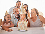 Children birthday party, birthday cake or candles for blowing out with mother, father and senior grandparents in home. Fun, excited or happy kids and dessert food in celebration event in family house