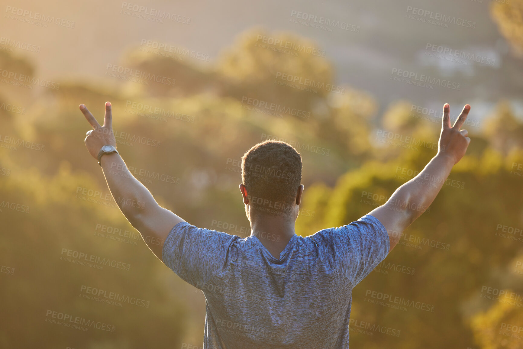 Buy stock photo Hands, peace and back with a sports black man outdoor in nature for exercise, fitness or training. Workout, motivation and view with a male athlete cheering reaching a goal or target for health