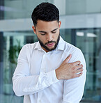 Shoulder pain, injury or accident of a businessman in the office with stress, frustrated and burnout. Medical emergency, muscle sprain or injured arm of a professional male employee at the workplace.