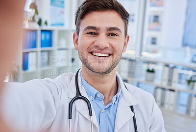 Buy stock photo Selfie, doctor and happy healthcare nurse in hospital office for consultation. Man, gp medical worker and professional cardiology therapist working or smile for photograph on phone in medic clinic