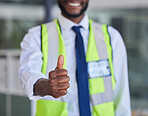 Black man, construction worker or thumbs up success, support and trust in office building, construction site or industrial warehouse. Zoom, smile or happy builder, property designer or engineer hand