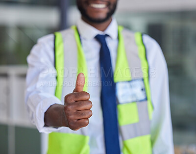 Buy stock photo Black man, construction worker or thumbs up success, support and trust in office building, construction site or industrial warehouse. Zoom, smile or happy builder, property designer or engineer hand