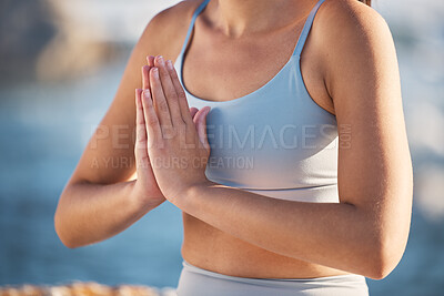 Buy stock photo Hands, yoga and meditation with a woman athlete outdoor in nature for mental health or wellness. Fitness, workout and zen with a female yogi sitting in the prayer position for inner peace or balance