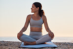 Yoga, meditation or zen exercise black woman relax on yoga mat at beach, sea or ocean for motivation, wellness or workout. Sunset, happy or girl portrait on sand for sport, chakra energy or training
