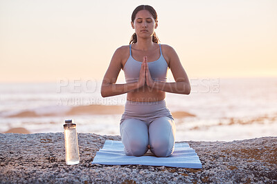 Buy stock photo Gen z woman, yoga and beach meditation, zen and fitness training, spiritual and prayer outdoor during sunset in nature. Calm female, mindfulness and healthy mindset for wellness at ocean in Hawaii