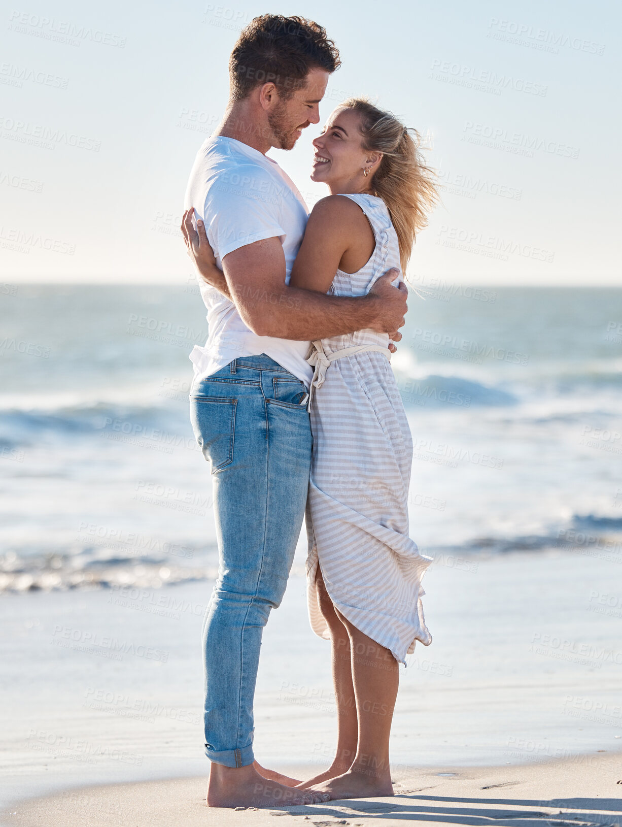 Buy stock photo Beach, hug and love couple for holiday, summer or vacation on tropical island date with ocean waves, sand on blue sky mockup. Happy, care and young marriage people by sea for honeymoon or anniversary