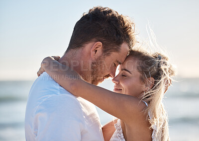 Buy stock photo Couple, love and hug on beach eyes closed, smile and happy for relax travel vacation or quality time together. Happiness, man and woman hugging for romance marriage, honeymoon or holiday in sunshine
