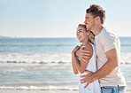 Mockup, beach and love with a young couple outdoor in nature for a romantic date together in summer. Sky, space and sea with a man and woman dating or bonding by the ocean water for romance