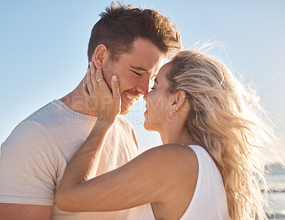 Buy stock photo Love, couple and beach holiday, vacation or summer date and honeymoon outdoors. Affection, romance and smile of man and woman ready for kiss, having fun and enjoying quality time together at seashore