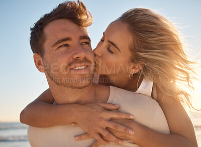 Buy stock photo Love, summer and couple kiss at a beach at sunset, hug and romantic travel, holiday and fun against blue sky background. Romance, bond and woman with man at the sea, embrace and enjoy trip in Mexico