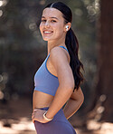 Happy woman, portrait and park fitness, runner and workout in fresh air, body wellness and healthy lifestyle. Young athlete, outdoor exercise and training with music earphones, motivation and smile 