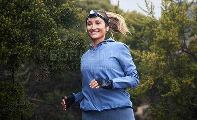 Buy stock photo Fitness, nature and woman running on a trail for cardio workout in the woods or green garden. Health, wellness and young woman from Canada training for sports marathon, race or competition in forest.