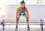 Fitness, barbell weight and portrait of a woman doing a lifting exercise for strength, health and training. Sports, strong and healthy athlete doing a weightlifting workout with motivation in the gym