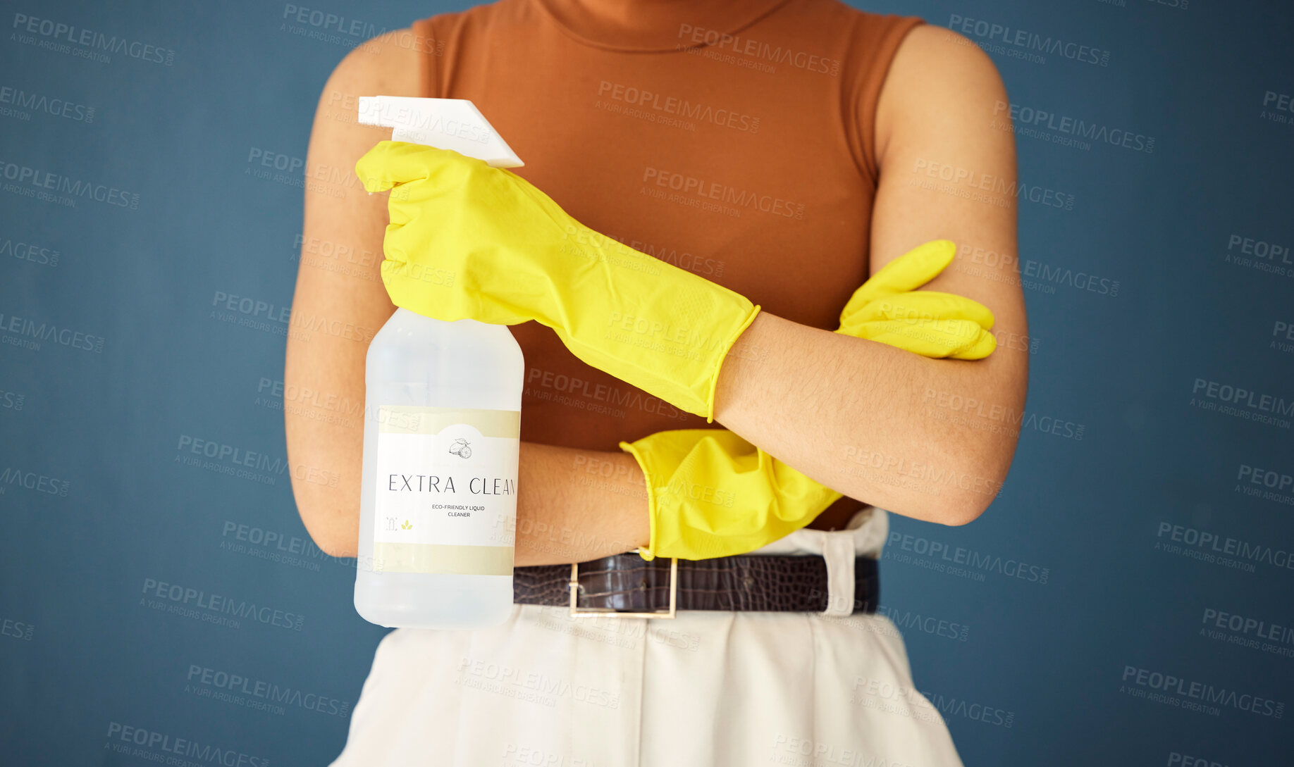 Buy stock photo Cleaning, product and woman with organic bottle spray in studio for hygiene, fresh and eco friendly detergent on blue background. Hand, girl and cleaner to stop, prevent and protect against bacteria