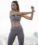 Fitness, nature and woman stretching in running training, cardio exercise or outdoor workout in peace. Focus, morning and healthy sports girl runner ready to start activity or exercising a slim body