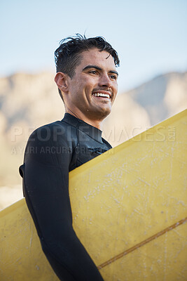 Happy surfer, man carrying surfboard and board for surfing sport on ocean waves for fitness workout, summer wellness surf and water training exercise. Beach freedom, sea wetsuit and surf in Australia
