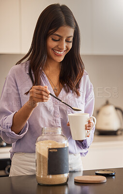 Buy stock photo Woman, smile and morning making coffee in the kitchen for routine, start or daily preparation at home. Female smiling and adding sugar to mug for sweet warm beverage drink or caffeine at the house