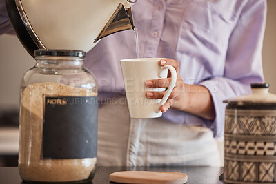 Buy stock photo Water, drink and woman make coffee in kitchen for motivation, energy and caffeine in morning. Lifestyle, cafe and closeup of hands pouring water from kettle to mug for hot beverage, espresso and tea