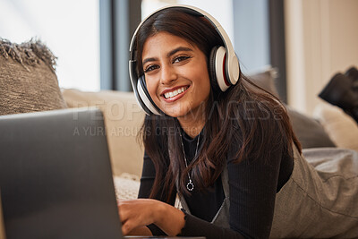 Buy stock photo Woman portrait, headphones and computer video streaming with music feeling happy in a living room. Indian person with happiness smile with technology in a house online on web and social media website