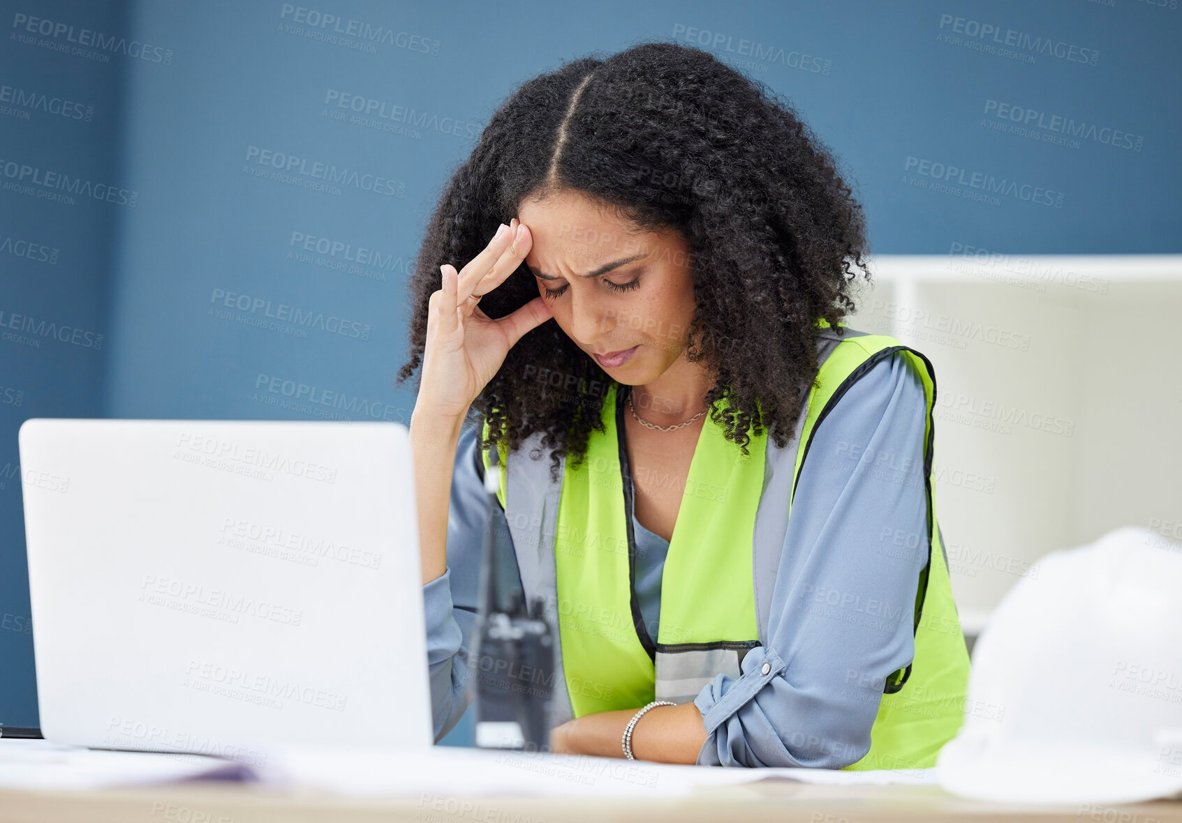 Buy stock photo Construction, stress and woman engineer at laptop, architect or contractor in office with headache from work. Burnout, anxiety and deadline for building project, black woman in safety vest at desk.