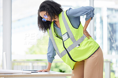 Buy stock photo Woman, back pain and construction worker with safety vest, office or building industry with hurt muscle. Black woman, architect and lower back injury in career as engineer, builder or contractor