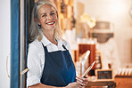 Senior, store and owner portrait with tablet excited, happy and optimistic with shop career venture. Sales, small business and happiness of mature woman at shop entrance with welcoming smile.

