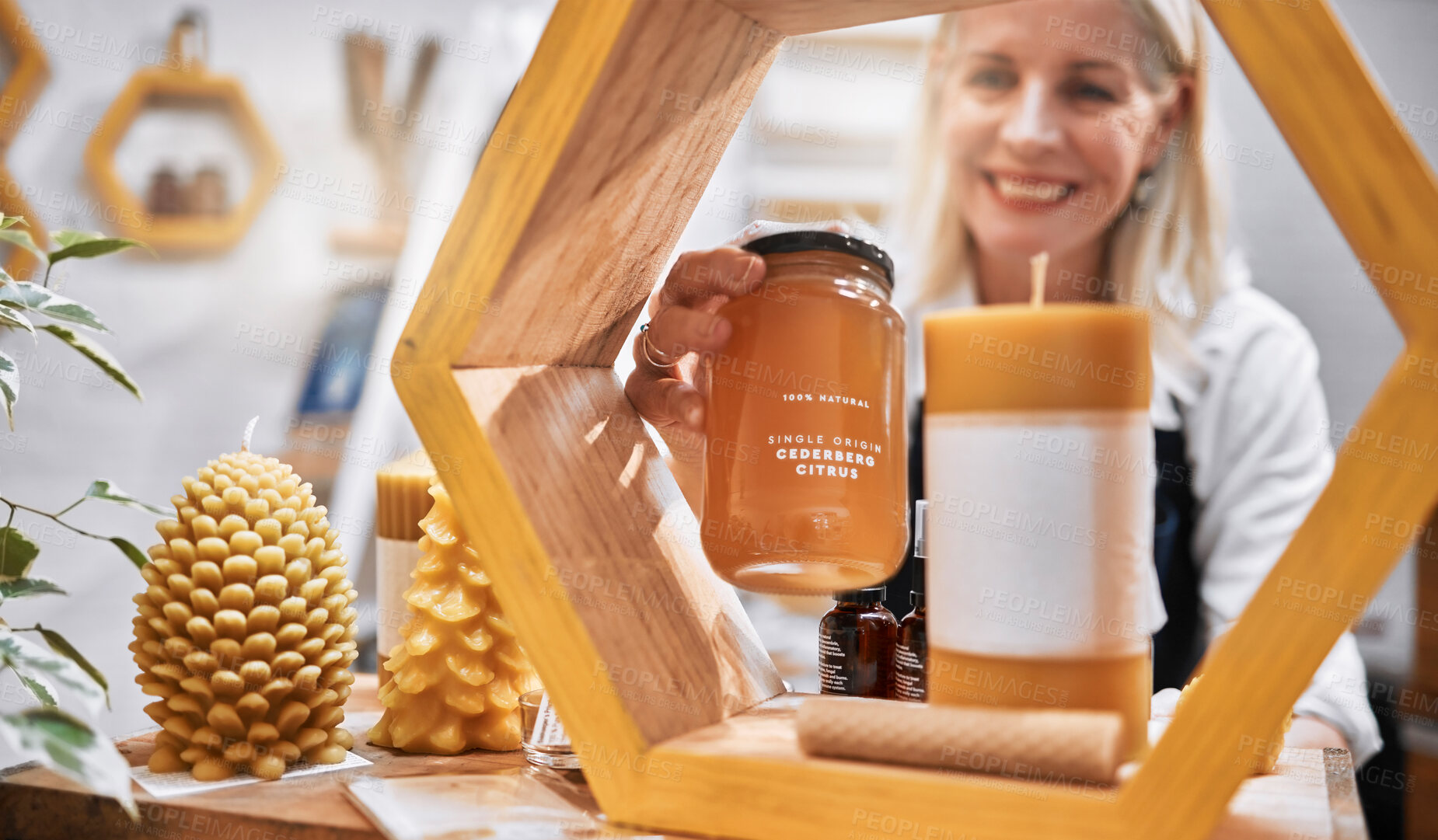 Buy stock photo Mature woman, honey shop and shelf order in organic bees product sales, natural medical food or healthy retail stock. Smile, happy and small business store owner with grocery promotion on ingredient