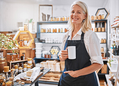 Buy stock photo Coffee, portrait and senior small business entrepreneur standing in her retail wellness shop. Leader, owner and portrait of a professional elderly woman boss drinking cup of tea in her startup store.