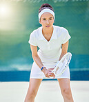 Sports, tennis player and outdoor court for a competition, match or game with a woman ready for fitness, exercise and training. Athlete model with tennis racket for action and thinking about win