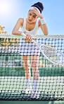 Tired woman on tennis court, headache pain in sports training and rest after match in South Africa. Young athlete frustrated by score, training for game with racket and stress of fitness performance