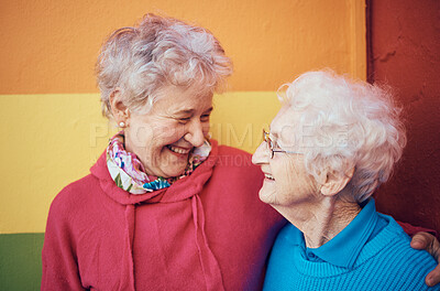 Buy stock photo Friends, happy and retirement with a senior woman and friend outdoor together on a color wall background. Smile, freedom and glasses with mature female friendship bonding or laughing outside