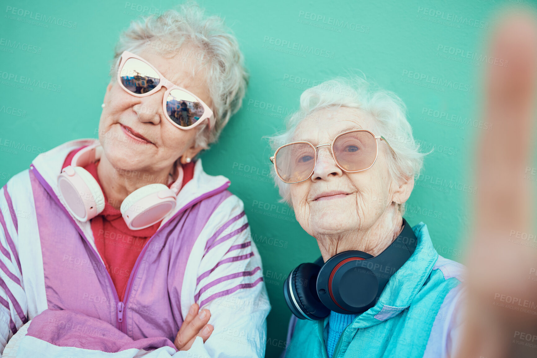 Buy stock photo Senior women, fashion and retro selfie with sunglasses, headphones and vintage clothes with cool mindset outdoor. Portrait of aesthetic old people or friends together for pop art profile picture
