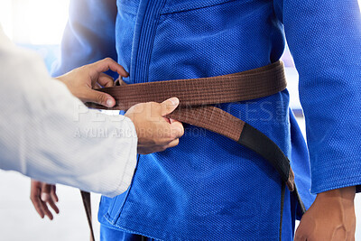 Buy stock photo Karate brown belt, teacher and student fitness, taekwondo training, sports graduation and workout learning. Martial arts uniform, fighter and trainer getting ready in dojo gym, practice and exercise 