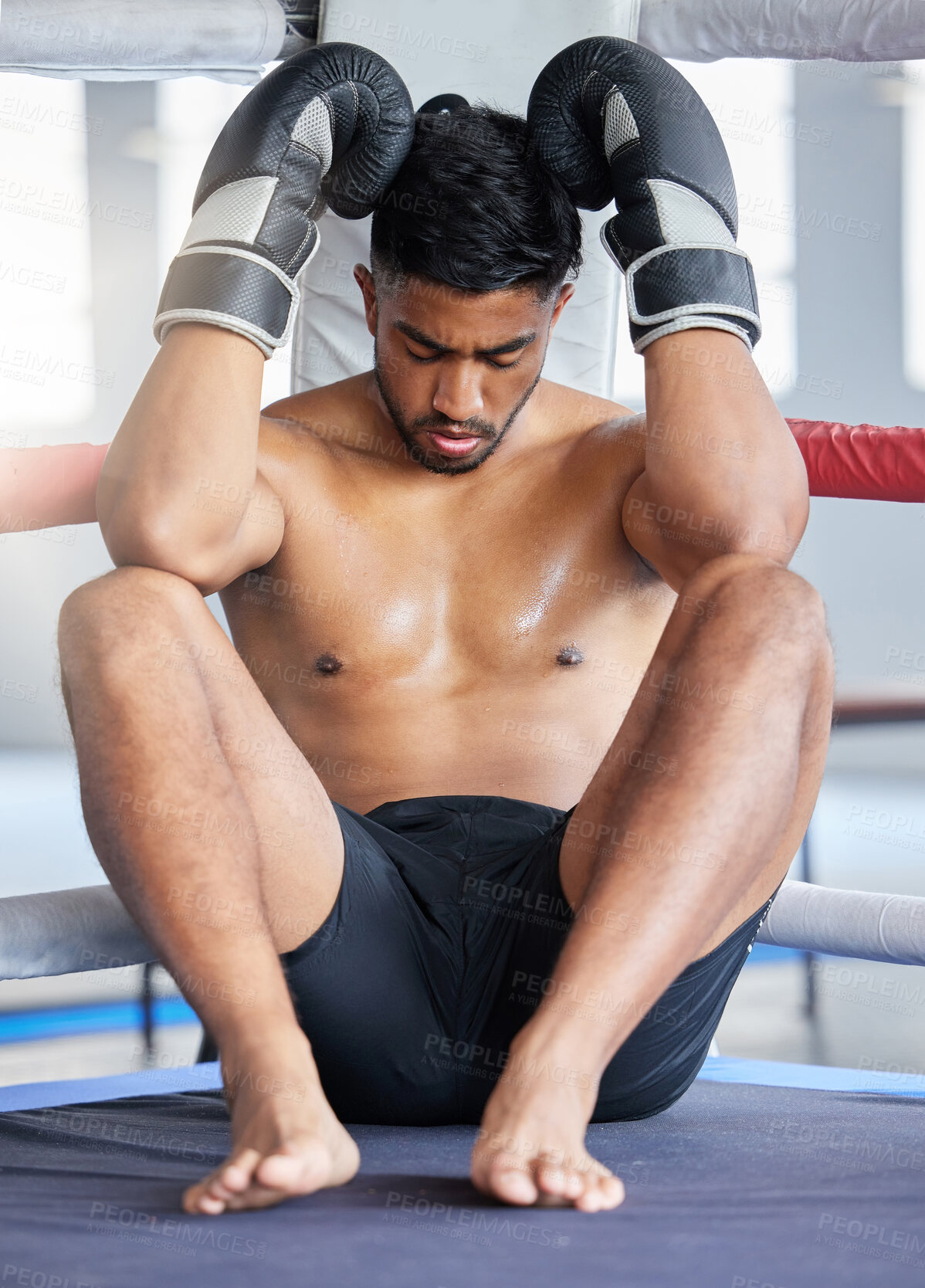Buy stock photo Tired man, boxer and fitness in sports match for ring out finish, training or competitive workout at the gym. Exhausted or fatigue man fighter in boxing arena on break from intense fighting exercise