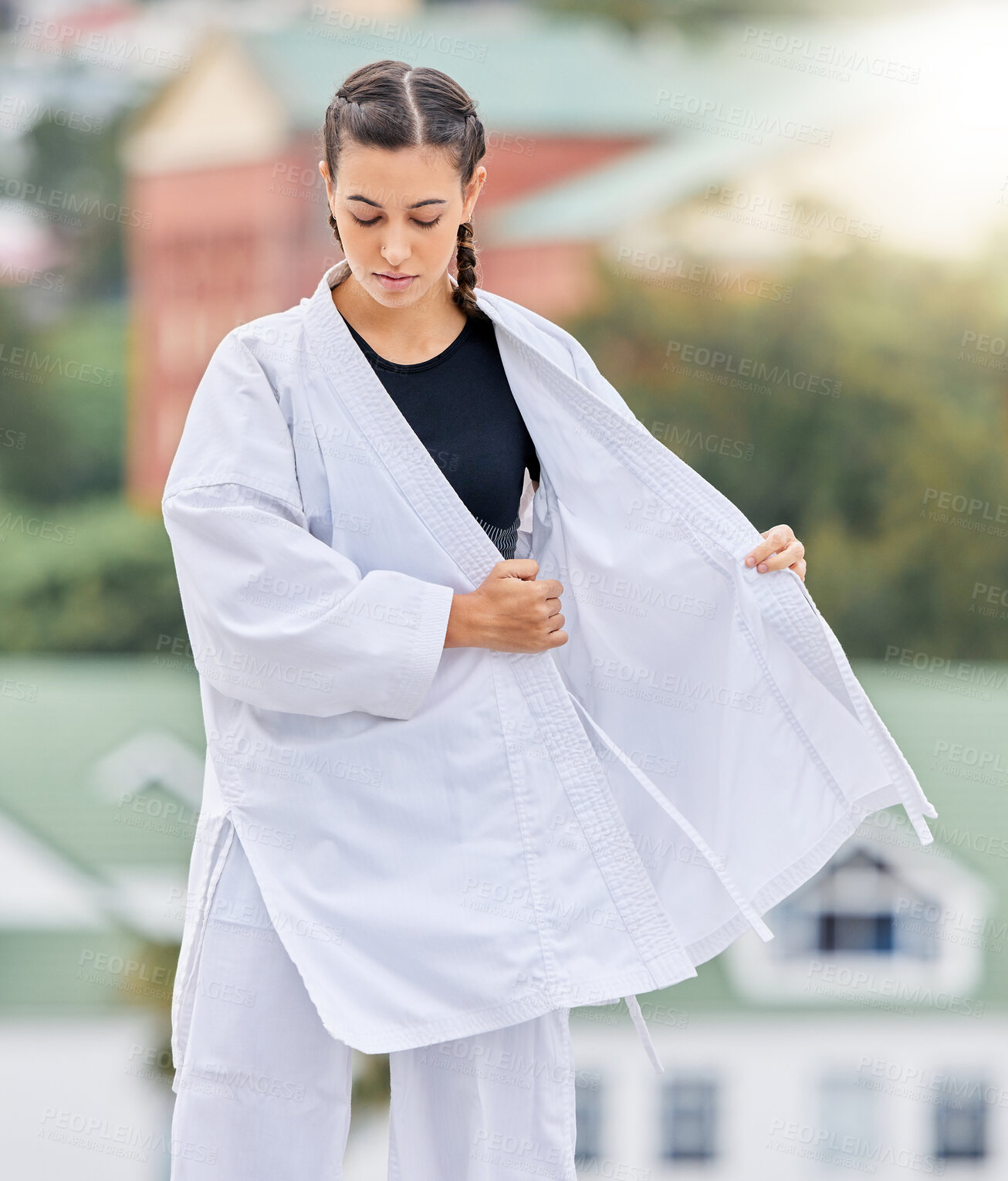 Buy stock photo Karate woman, martial arts uniform and fighter ready for a professional competition tournament with focus, honor and discipline. Judo, sports self defense and fighting motivation in dojo fight event 