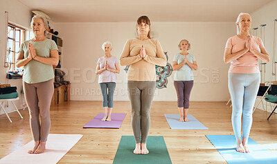 Buy stock photo Yoga class, exercise and meditation prayer position of senior women together for fitness, workout and chakra training for zen, peace and balance. Old people at gym for pilates, health and wellness