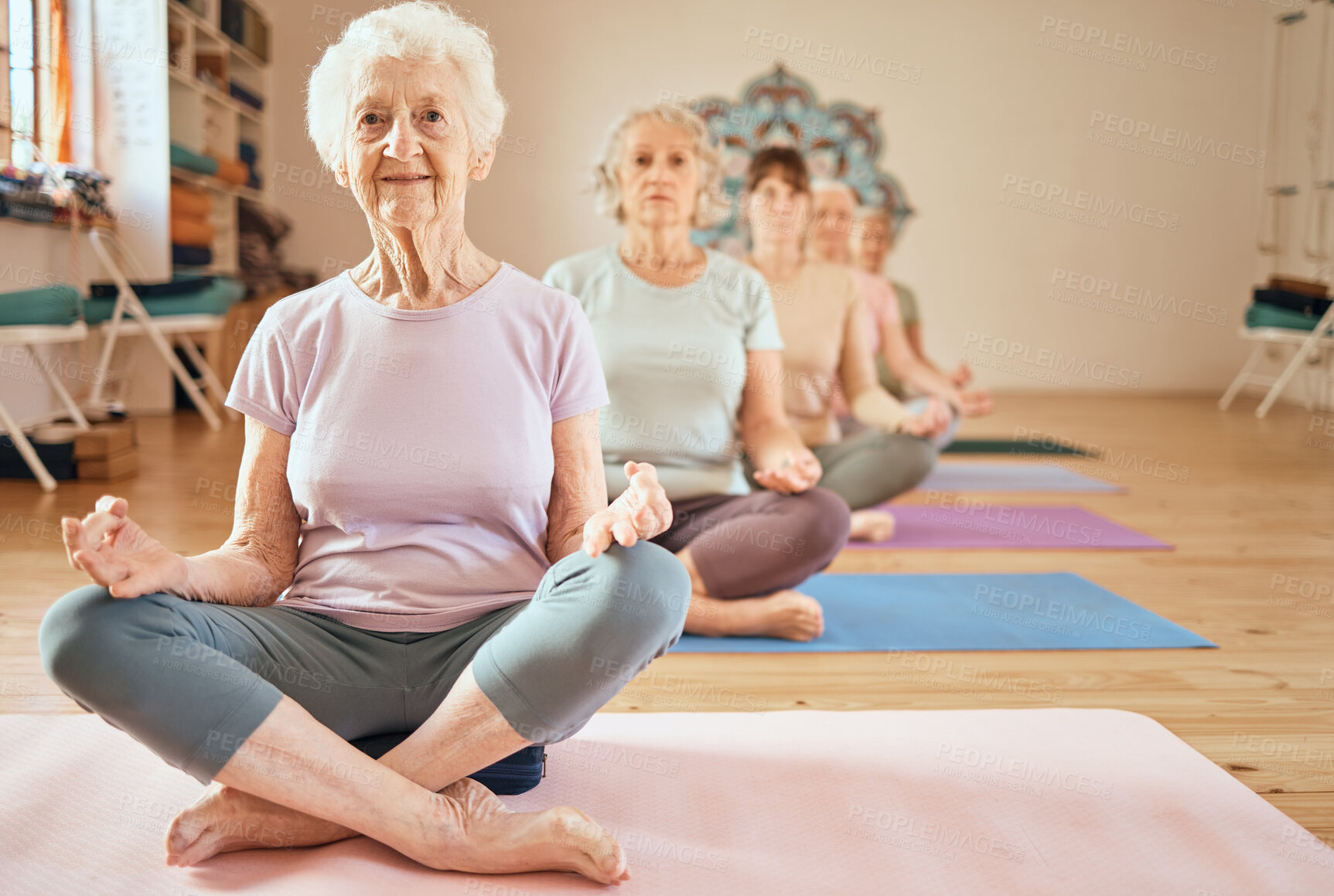 Buy stock photo Yoga, exercise and senior woman in lotus for meditation, mindfulness and zen workout for health and wellness in retirement. Group of old people together yoga spiritual, chakra and balance training