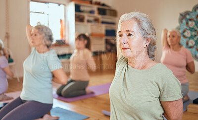 Buy stock photo Fitness, yoga and senior women stretching and training body, breathing and mindfulness together in a studio. Wellness, meditation and zen elderly people exercise in retirement with a cow face pose