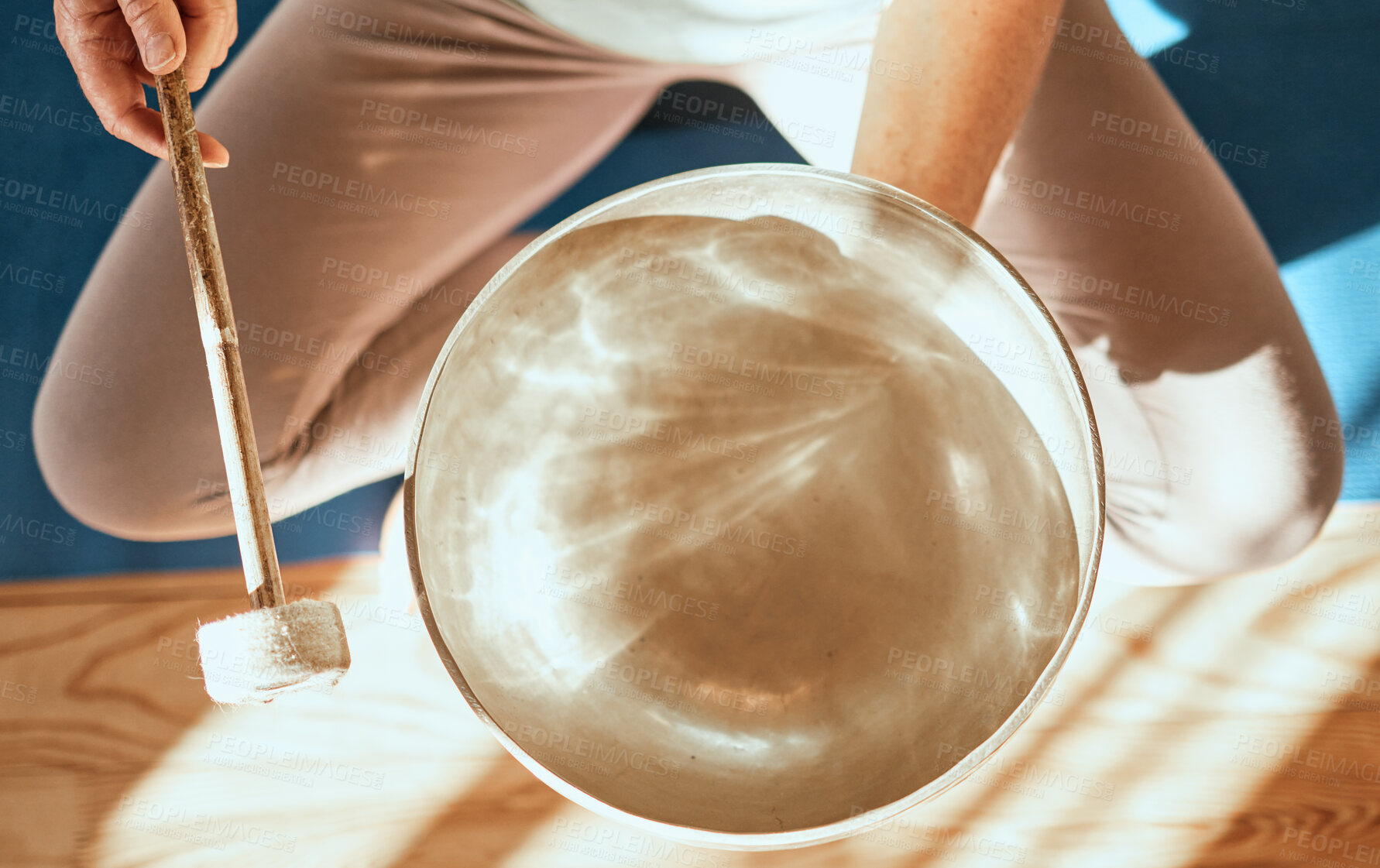 Buy stock photo Meditation, wellness and person with Tibetan singing bowl for mindfulness, calmness and peace in yoga. Spiritual healing, exercise and top view of hands with bowl for sound therapy, harmony and zen