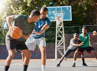 Buy stock photo Basketball, sports and competition with a black man athlete playing a game on a court with friends or a rival.  Team, fitness and health with a male basketball player training on a basketball court