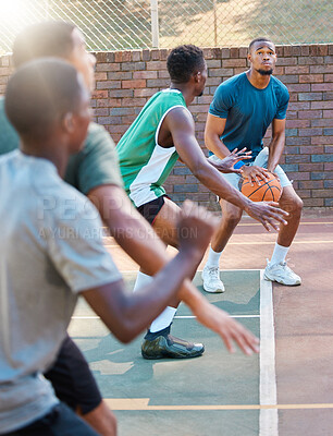 Buy stock photo Basketball, game and team sports for match point, score or ready for a shot at the basketball court. Basketball players in sport fitness, exercise or workout at the court together in the outdoors