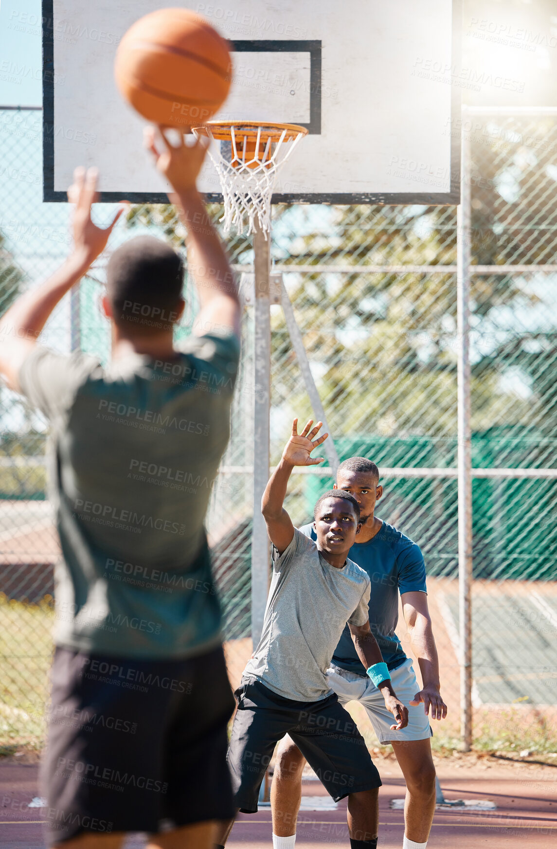 Buy stock photo Sports, basketball and men playing in park ready to score goal and win game, match or practice. Fitness, teamwork and group of male athletes on basketball court for exercise, workout and training