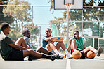 Basketball, sport and team break for social discussion, conversation or relaxing on the basketball court. Basketball players in fitness, communication and laughing together after fun sports game