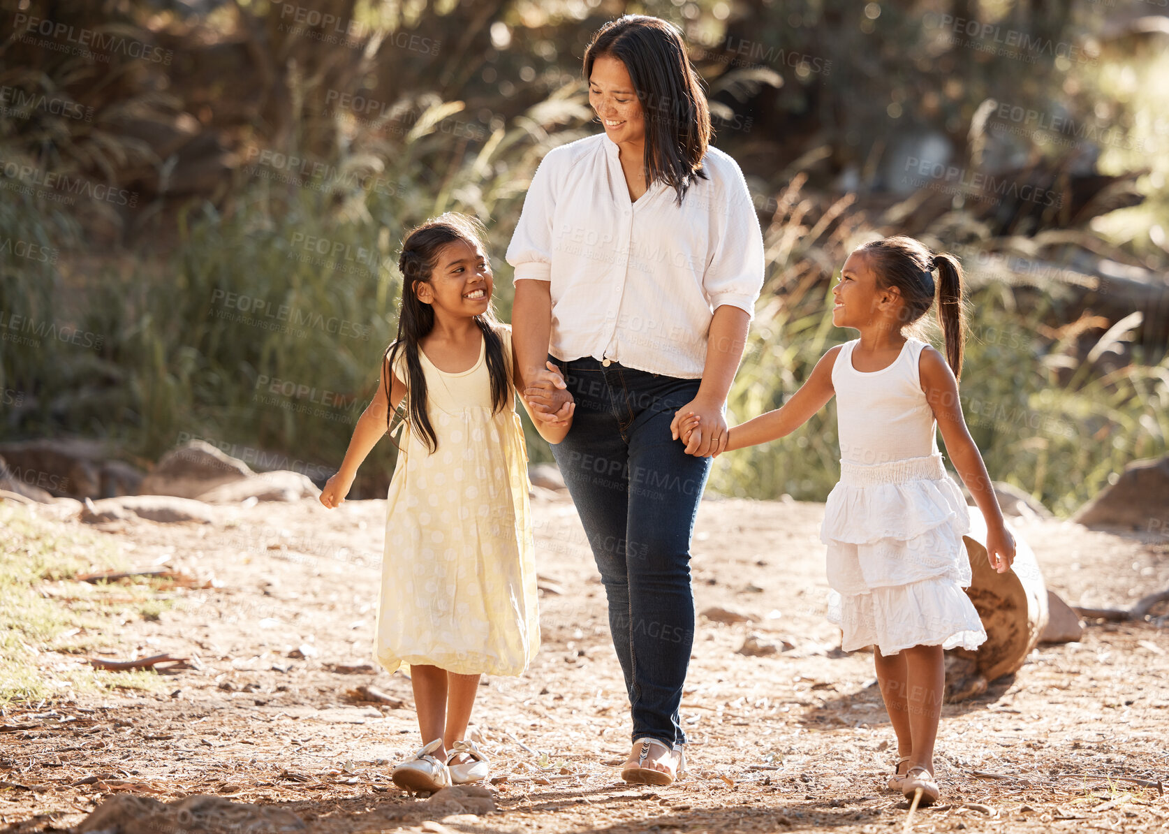 Buy stock photo Mother, children and park walking holding hands with girl and mama in summer with happiness. Kids love, smile and kids care relax in nature with mom support and sunshine together feeling happy