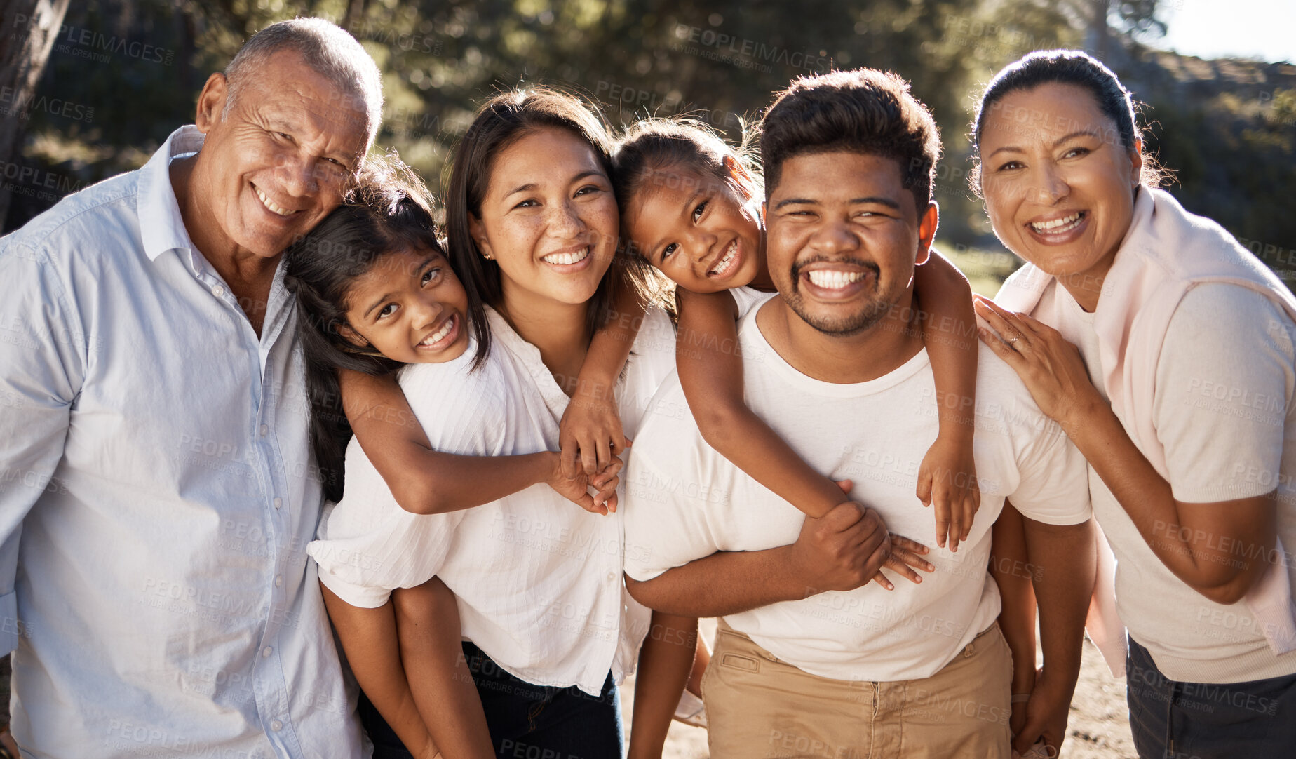 Buy stock photo Portrait of grandparents, parents and children in park enjoying holiday, vacation and weekend together in nature. Love, happiness and Mexican family bonding, smiling and having fun with kids outdoors