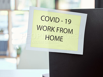 Buy stock photo Covid, sign and work from home at the office for health and safety rules or regulations during pandemic. Label post of corona virus restrictions for working remote, quarantine or control at workplace